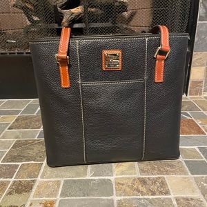 Dooney and Bourke pebble grain Lexington, new condition! Black leather.